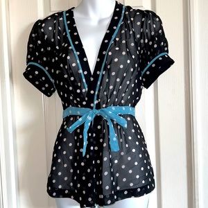 Short-sleeved sheer black/white polka dot blouse with light blue accents